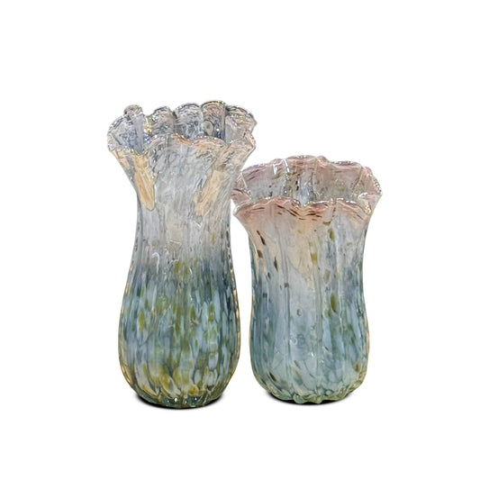 Two fluted glass vases with a mottled blue, green, and gold gradient, standing on a white background.